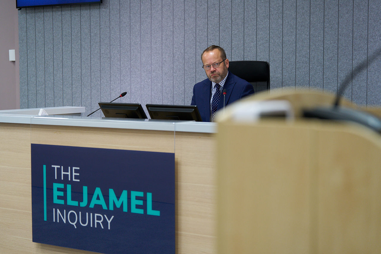 Lord Weir is pictured at his desk in the Eljamel Inquiry hearing suite