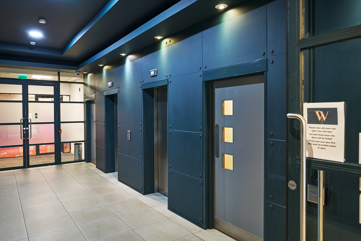 Three closed lift doors 