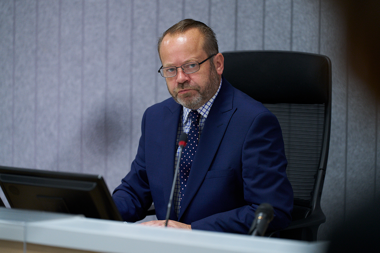Lord Weir, Chair of the Eljamel Inquiry, at his desk in the hearing room