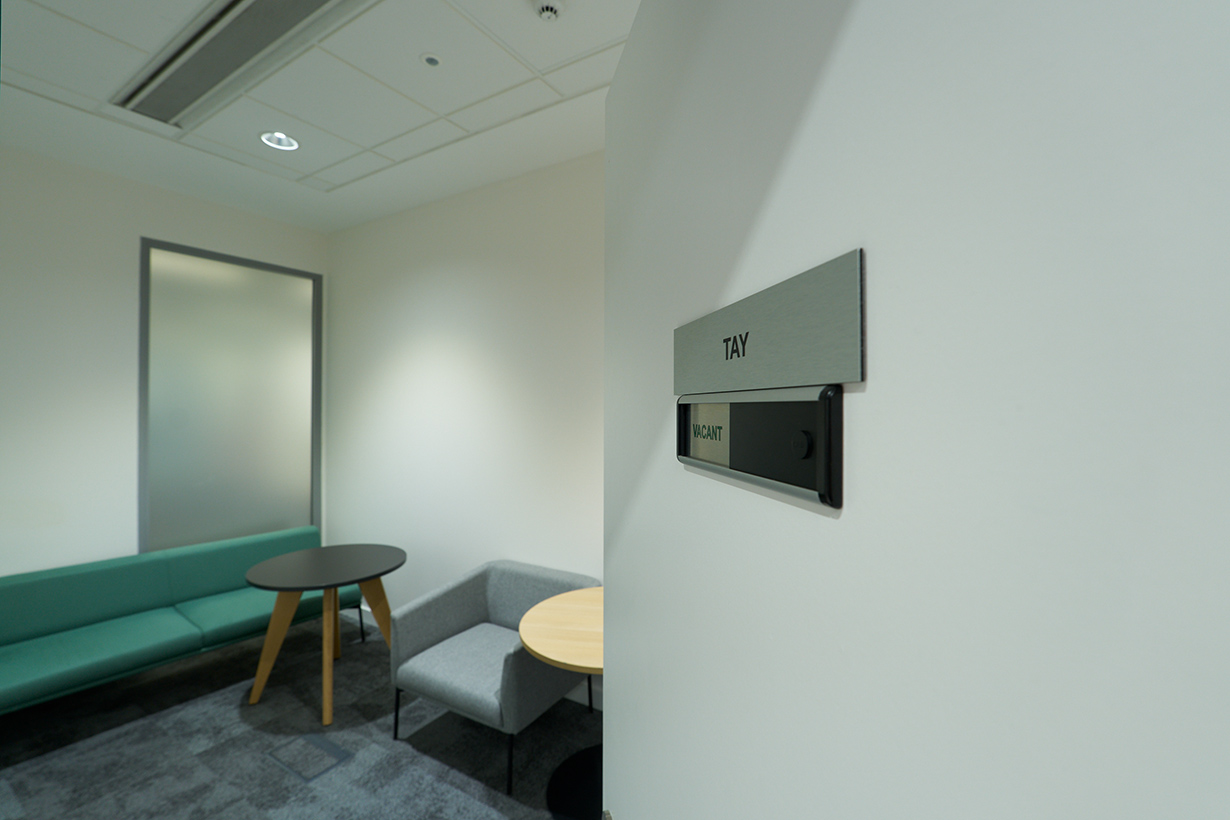 View from doorway to inside of a private room within hearing suite